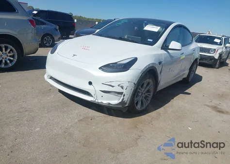 2023 Tesla Model Y Awd/Long Range Dual Motor All-Wheel Drive z USA, uszkodzony, nr VIN 7SAYGDEE4PA167788